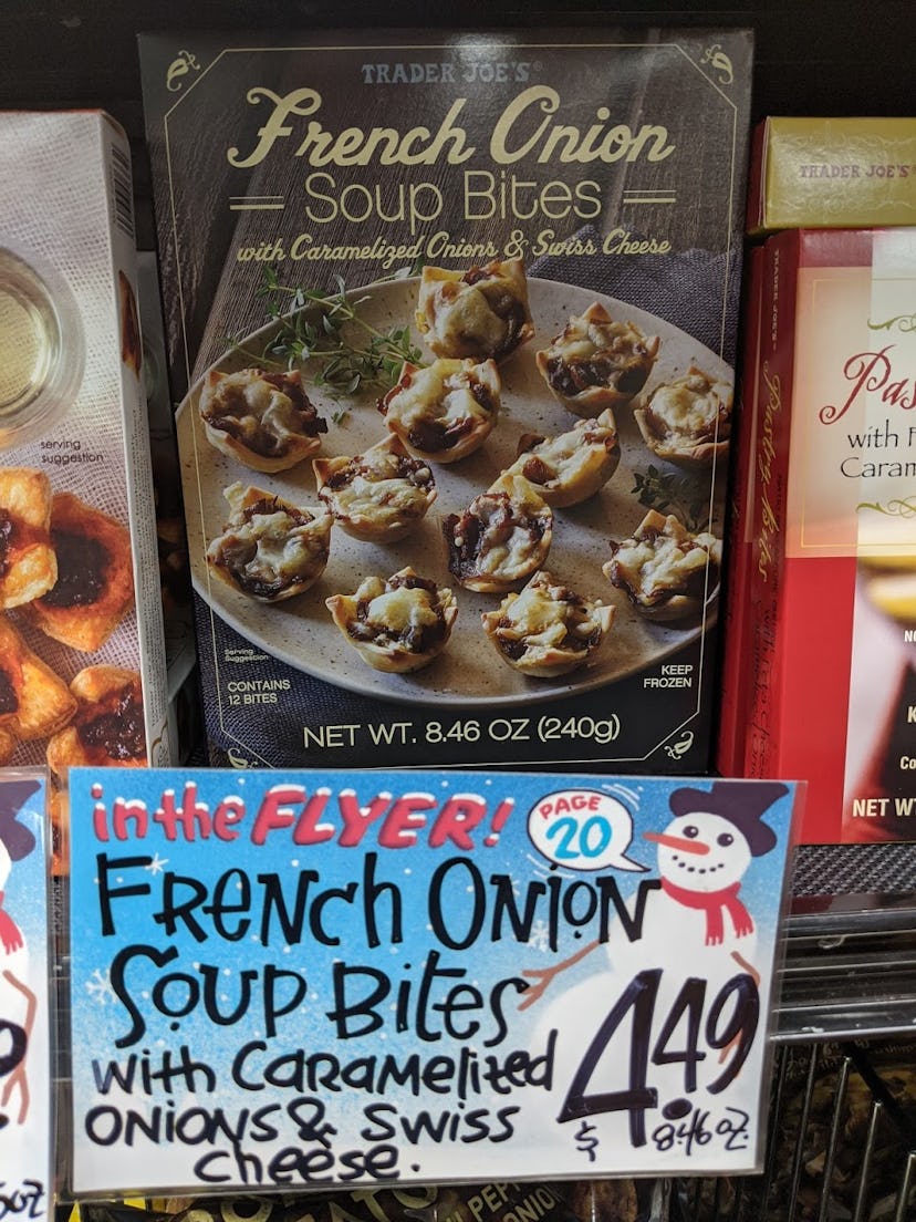 Trader Joe's display of packed, pre-made, frozen French Onion Soup Bites with caramelized onions & s...