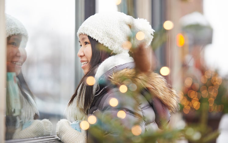 Young Asian woman having best Capricorn season, winter 2019.
