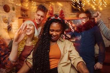 Friends wearing reindeer antlers ahead of Christmas 2019.