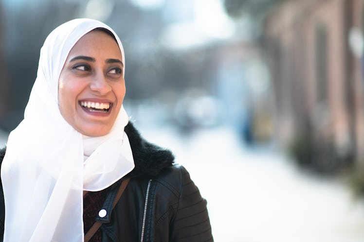 Young woman in headscarf during winter