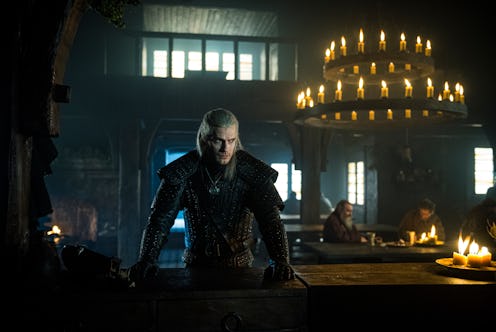 Geralt of Rivia in The Witcher enters a new town and inquires about a monster.