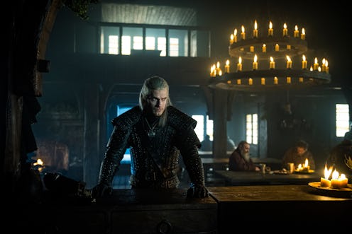 Geralt of Rivia in The Witcher enters a new town and inquires about a monster.