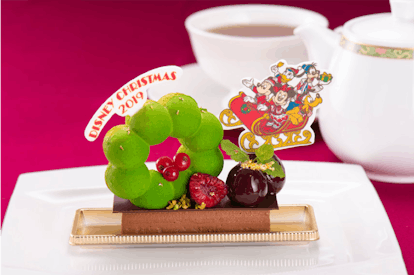 A chocolate mousse dessert decorated with Mickey Mouse and friends is a holiday treat available at t...