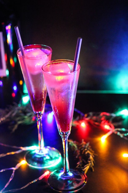 The Glow Spritz cocktail surrounded by Christmas lights is one of the drinks offered at Disneyland a...