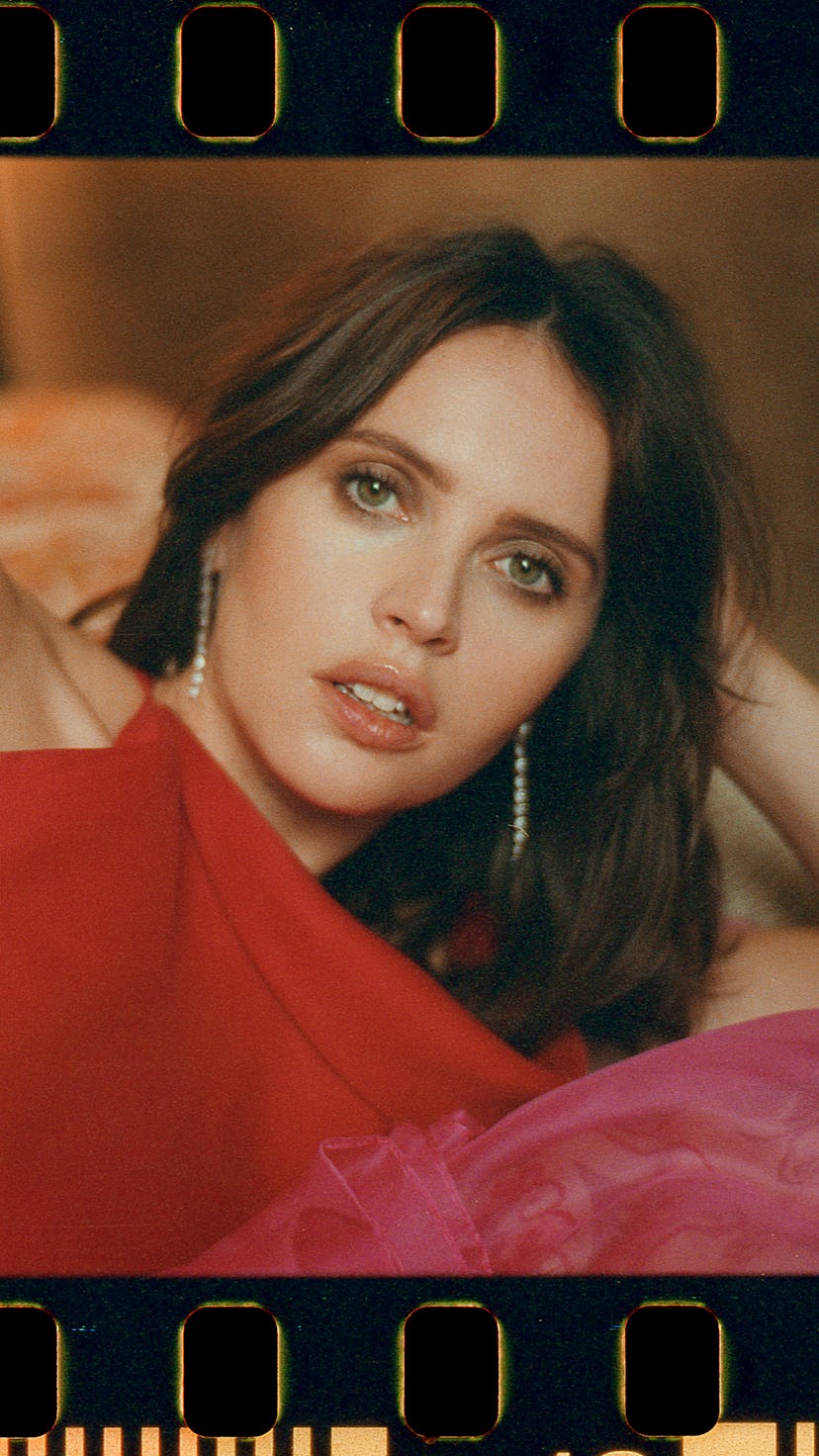 Three photos of Felicity Jones posing in a red top and pink skirt combination