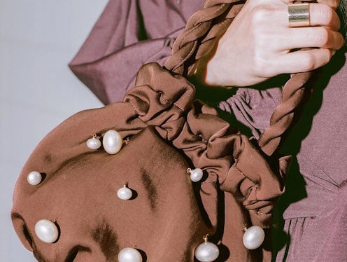 A brown bag with pearls
