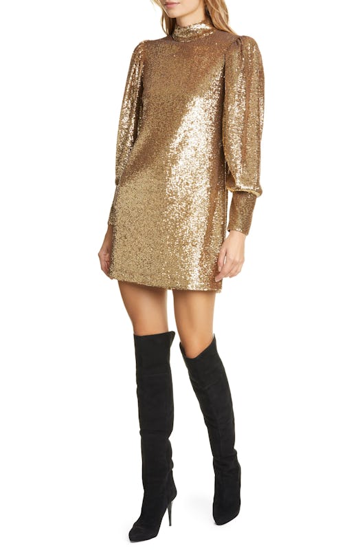 A model wearing a long sleeve sequin dress