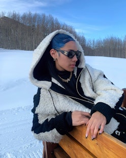 The Chanel Winter Boots Influencer Aleali May Swears By In The Snow