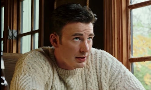 Chris Evans shared a photo of his dog Dodger wearing a sweater similar to the viral cable-knit sweat...