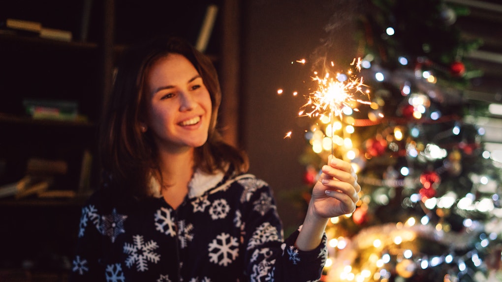 Young woman in Christmas pajamas