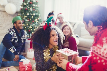 Young woman loves Secret Santa present