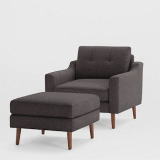 The Nomad Fabric Armchair With Ottoman 