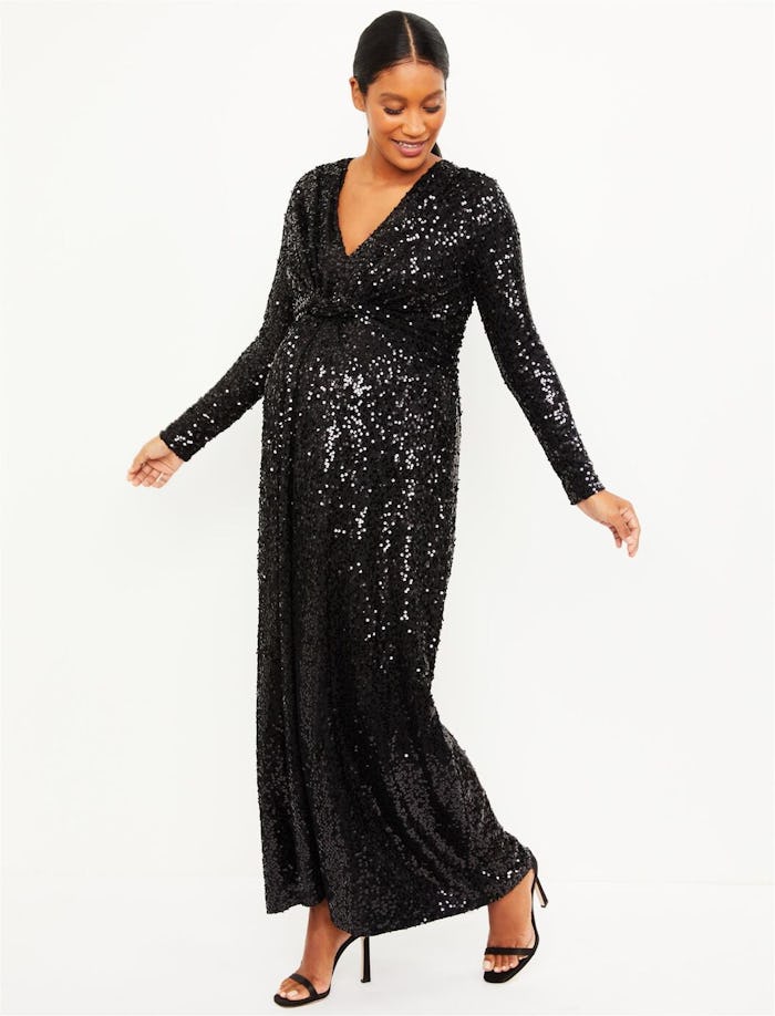 a woman in a sequined black maternity dress from a pea in the pod