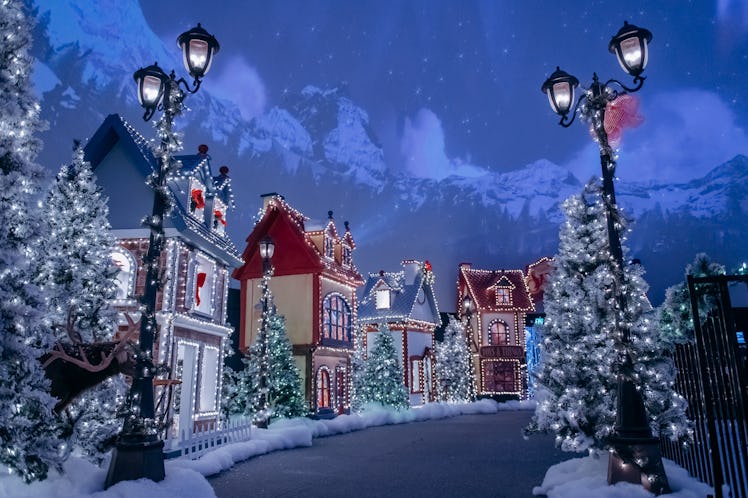The Santa North Pole Village in LA has life-size elf houses, fake snow, and Christmas trees lit up w...