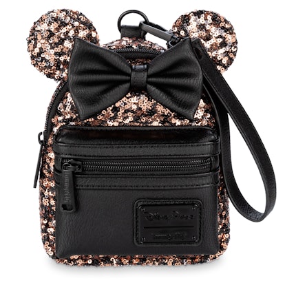 Disney's Belle Of The Ball Bronze Collection includes a mini backpack and a wristlet.