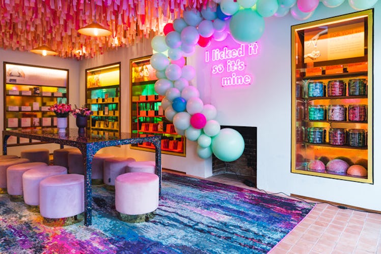 The Smith & Sinclair adult candy shop pop-up has candy on the shelves and vibrant balloons in New Yo...
