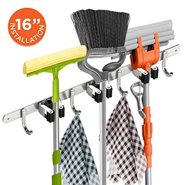 Homely Center Mounted Mop And Broom Holder