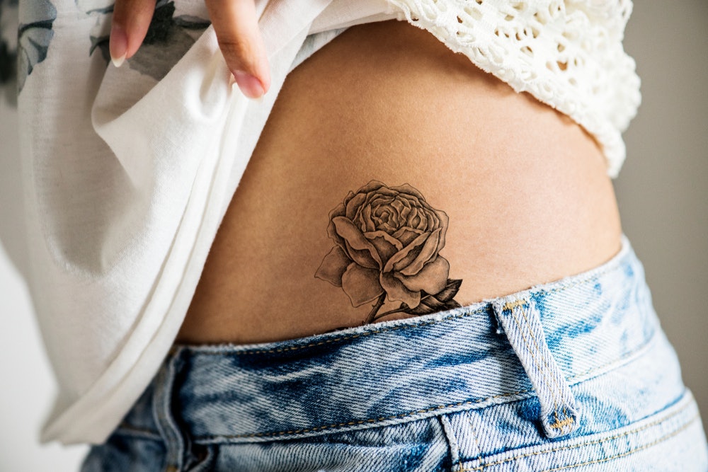 Rita Oras Tiny Flower Tattoo on Her Hip  Photos  POPSUGAR Beauty