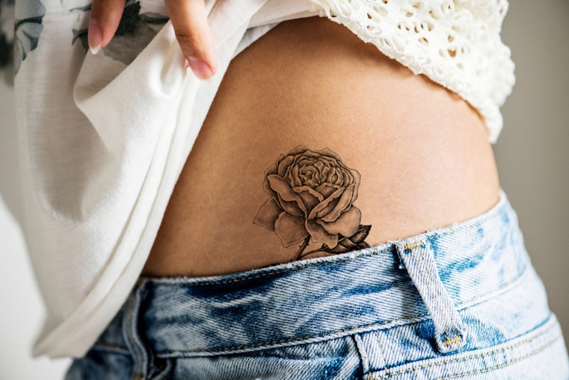 rose vine tattoos on hip