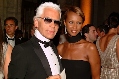 Iman and Karl Lagerfeld posing for a photo