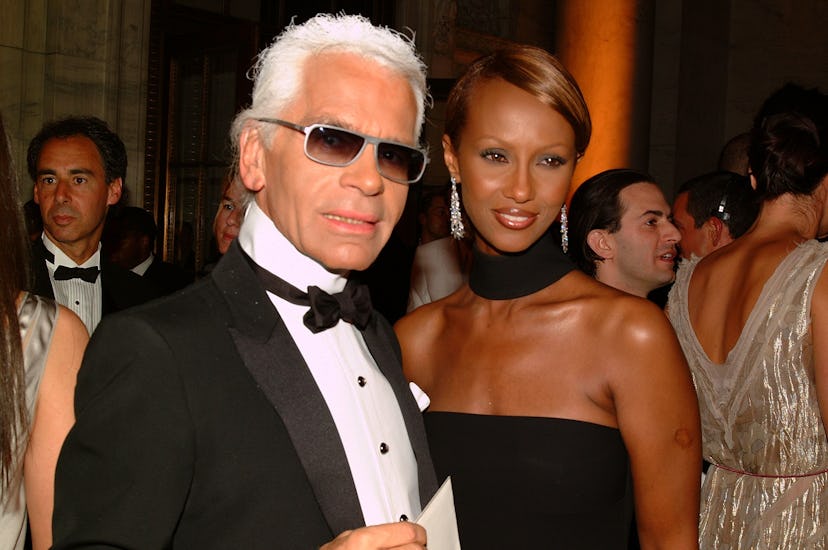 Iman and Karl Lagerfeld posing for a photo