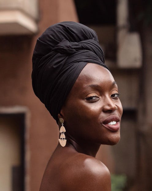 Influencer Folasade Adeoso looking over her shoulder