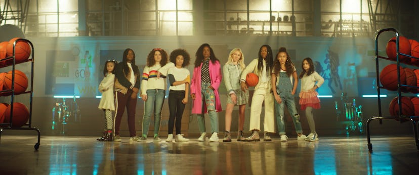 Kelly Rowland featured with eight high school girls promoting safe spaces for different hair types