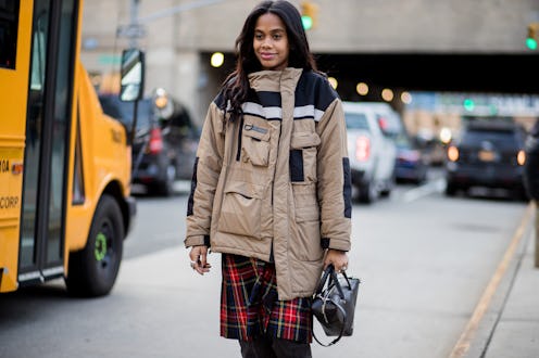 Jan Quammie wearing a winter oufit that she's bought this month while walking down the street