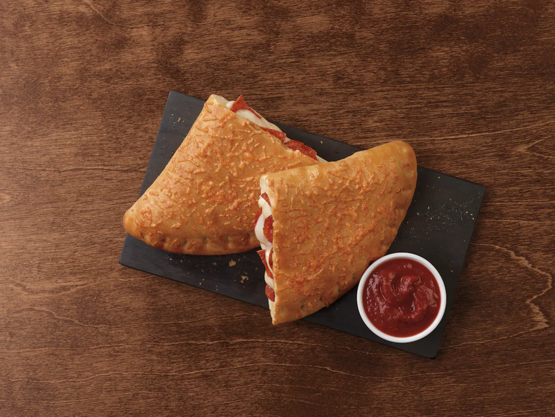 The Pizza Hut P’Zone Is Back For All Your 2019 March Madness Snacking Needs