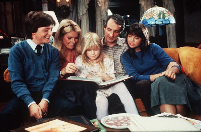 The Keaton family sitting on a couch in ‘Family Ties’