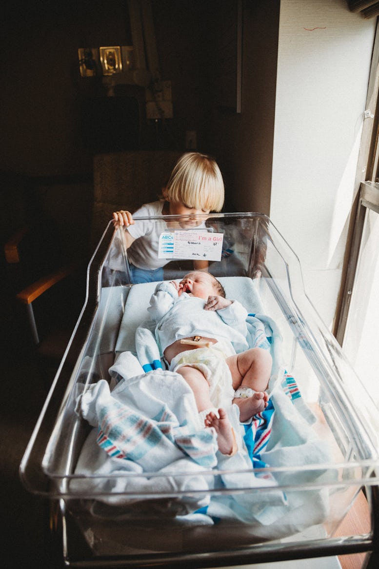 34 Moving Photos Of Siblings Meeting For The First Time That Are Full
