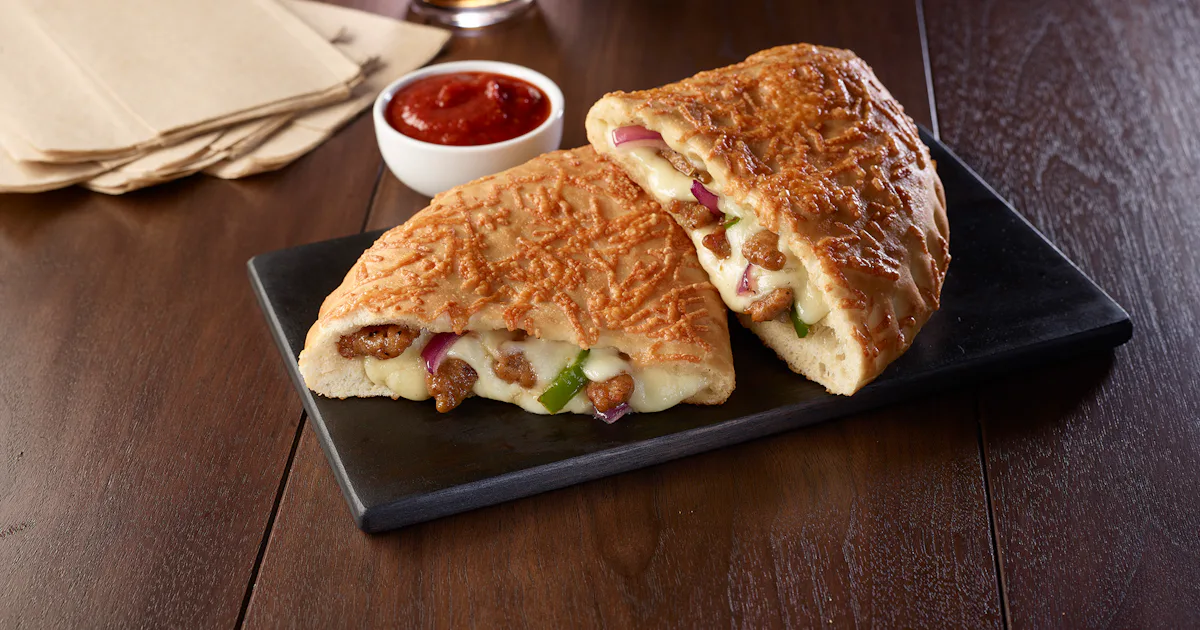 The Pizza Hut P'Zone Is Back For March Madness 2019, So Get Hype & Hungry