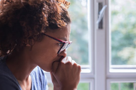 Woman feeling icky during her ovulation