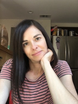 Brandy Ferner taking a selfie in a kitchen