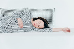 pregnant woman sleeping on couch