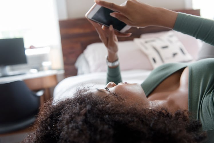 Here's why it may take your partner hours to text you back.