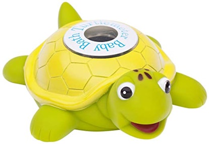 Baby bath yellow turtle toy on a white background