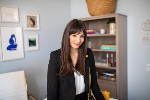 Designer Diana Sfera in a redecorated small office in New York City