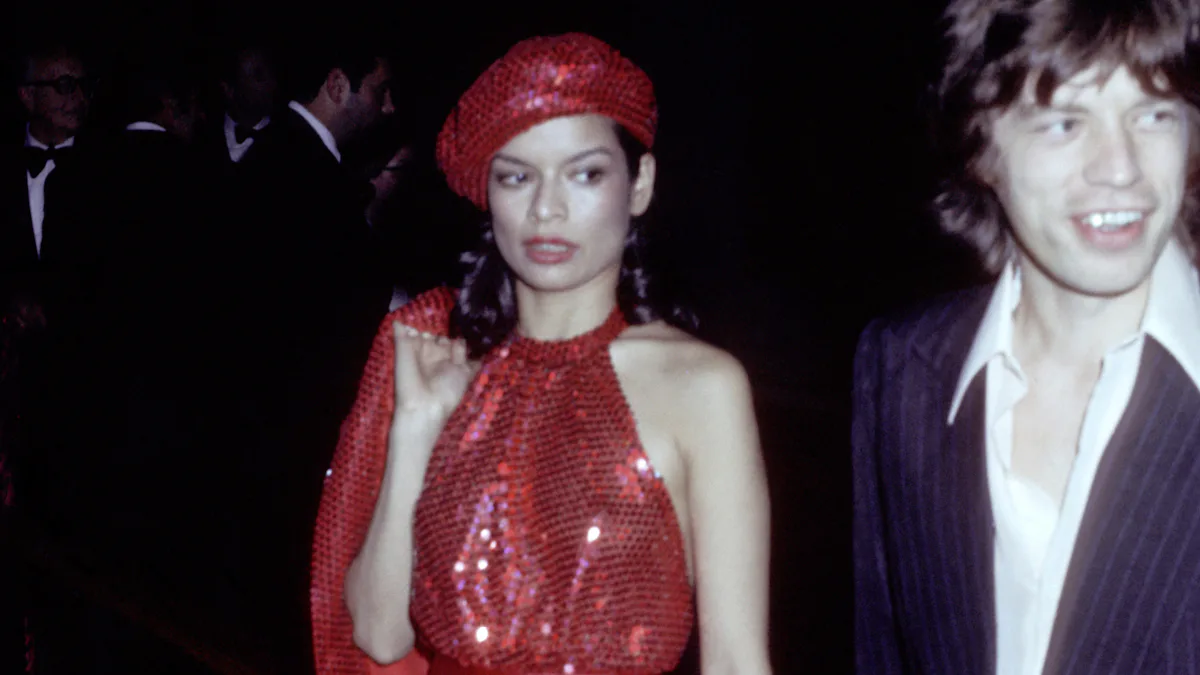 bianca jagger red sequin dress Bianca Jagger wearing a red satin dress, 1970's. Photo: Oscar Abolafia/Everett Collection (biancajagger015 Stock Photo