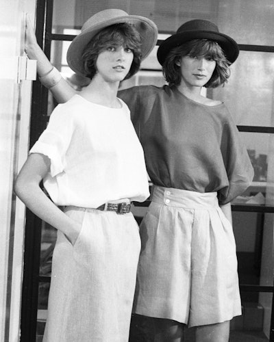 Two models in the Calvin Klein Resort 1983, one is in a long skirt and the other in bermuda shirts