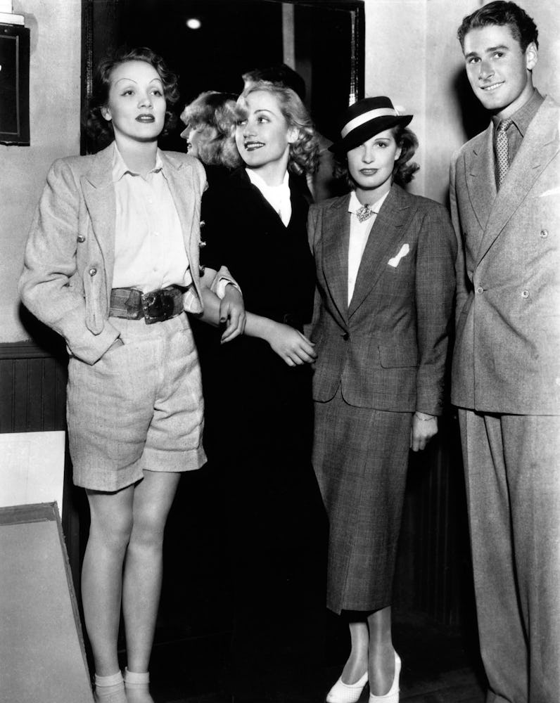 Marlene Dietrich in bermuda shorts with Carole Lombard, Lili Damita and husband Errol Flynn at Carol...