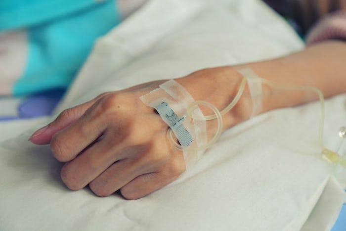 A woman being administered Zulresso through an IV for her PPD