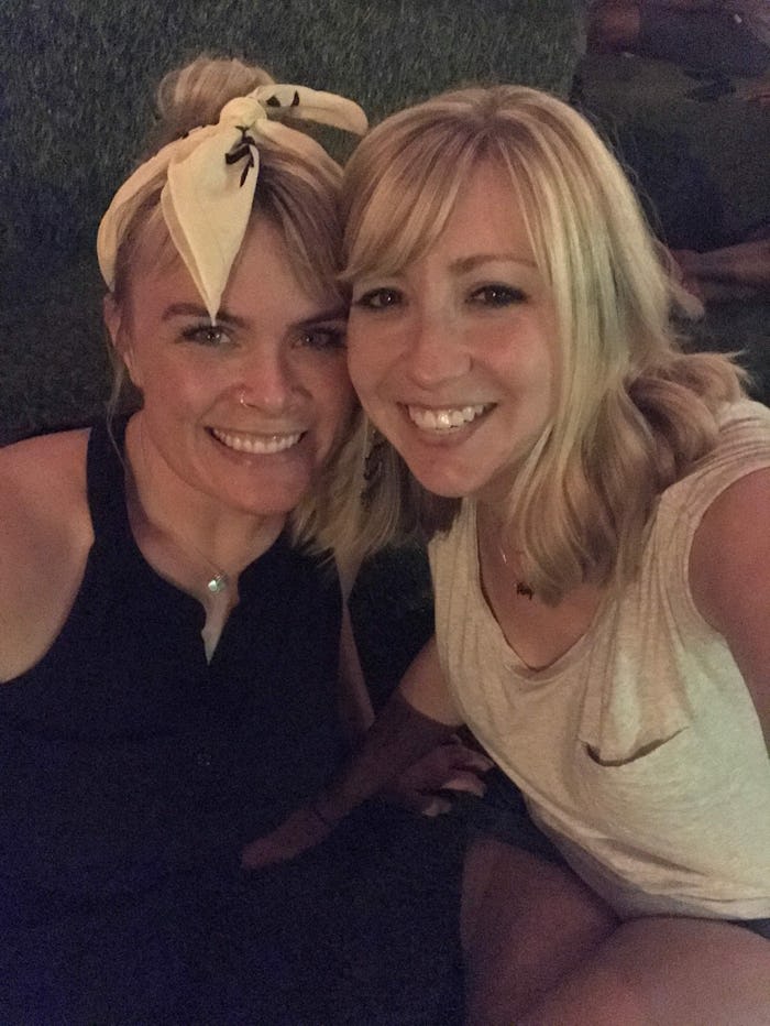 Two women who are best mom friends posing for a selfie 