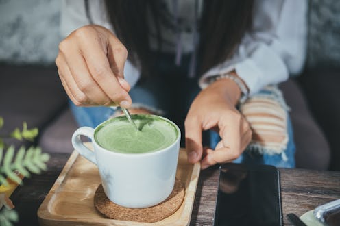 Preparing a cup of matcha