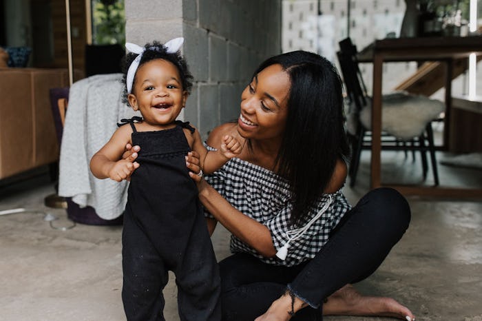 a mom and her toddler daughter