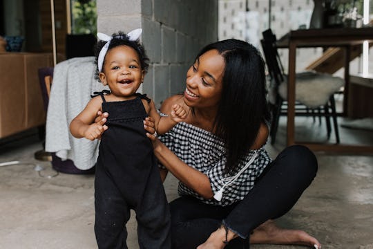 a mom and her toddler daughter