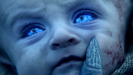The Night King changing a baby into a white walker.