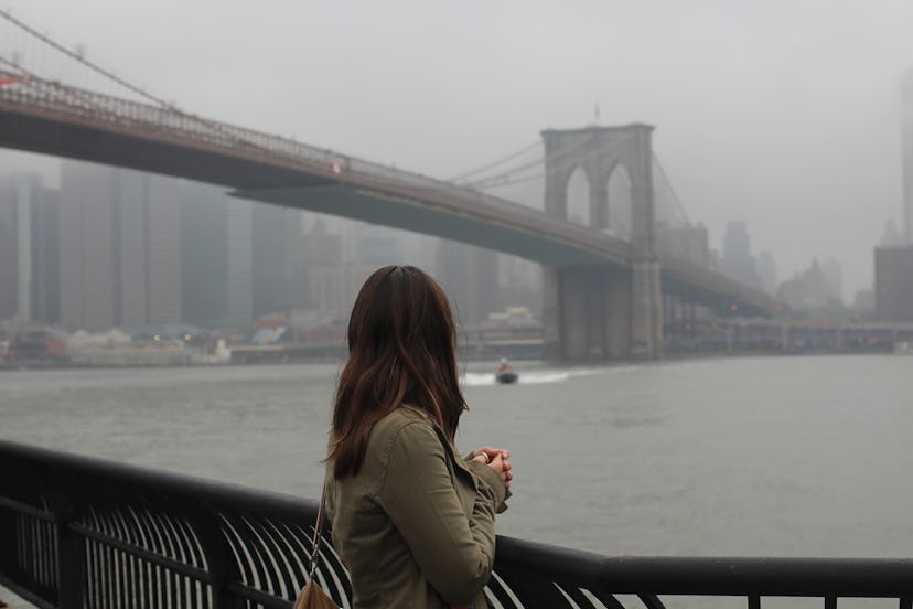 Anna looking over the Brooklyn Bridge