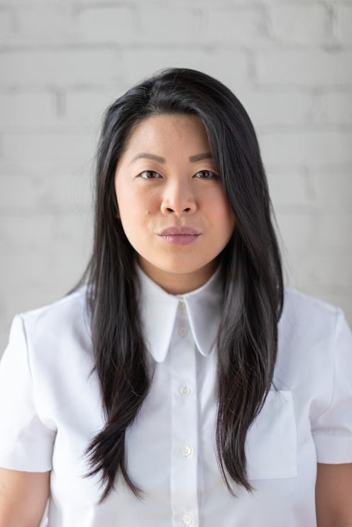 Mei Lin, an award-winning chef, Top Chef winner, and owner of Nightshade posing in a white shirt