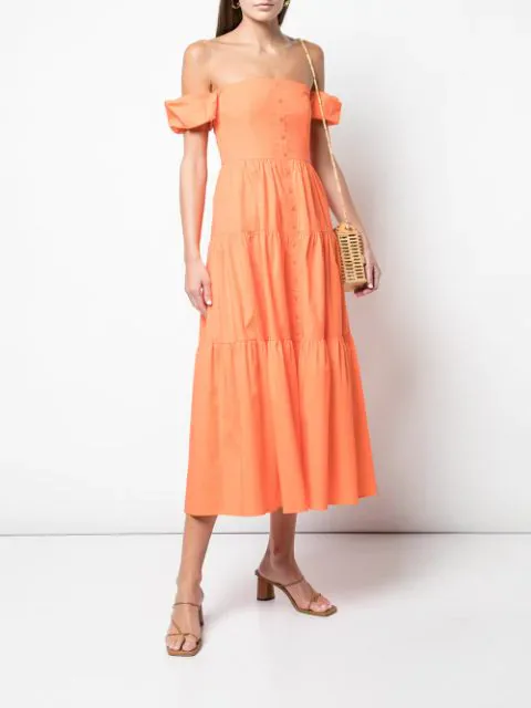 chrissy teigen orange dress LOS ANGELES, CALIFORNIA, USA